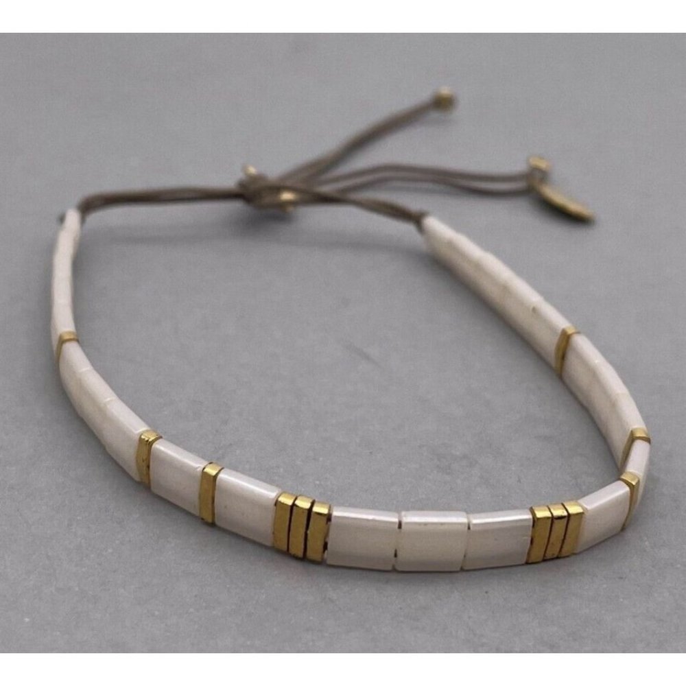 Sun Kissed by Johanne Stacking Shell Bracelets Adjustable Taupe Cord Bracelet